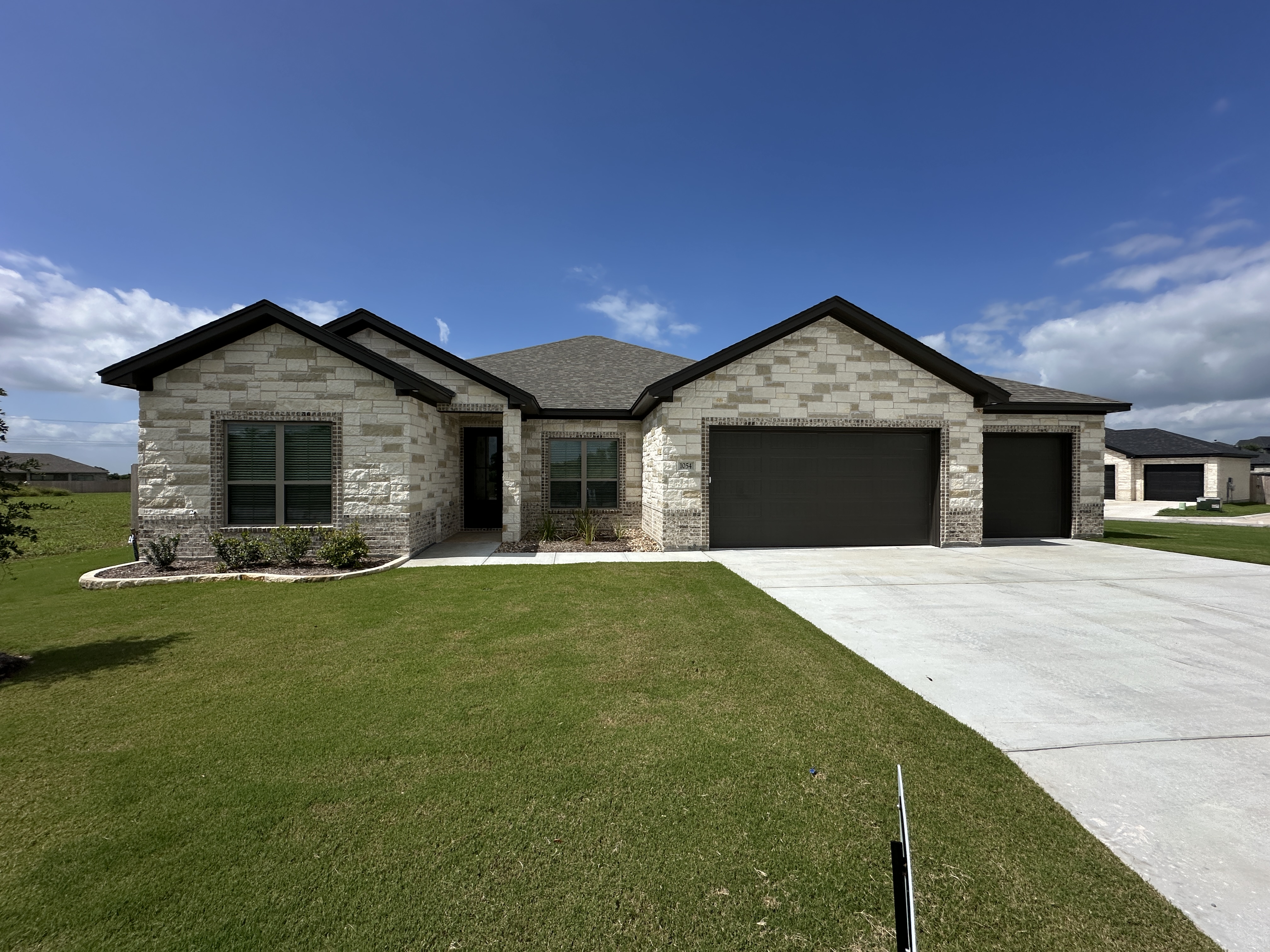 1054 Alice, Temple, TX 76502 — Rio plan by Carothers Executive Homes in Hartrick Valley, Temple, Texas