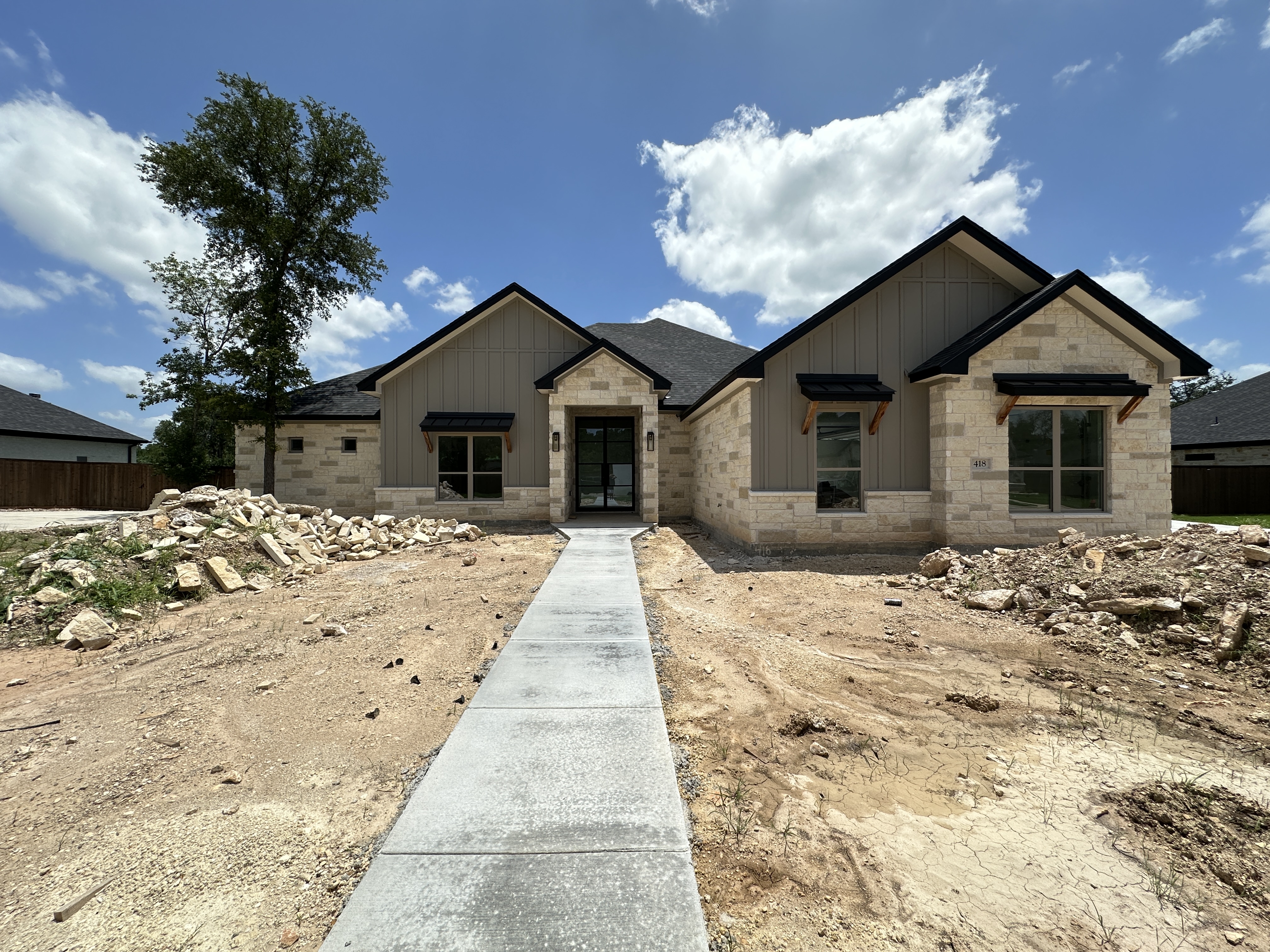 418 Dos Rios, Morgan's Point Resort, TX 76513 — McKinley plan by Carothers Executive Homes in Rancho Del Lago, Morgan's Point Resort, Texas